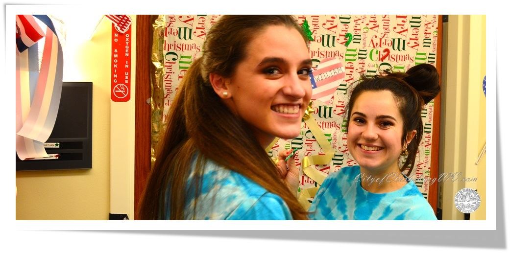 Girls Decorating Door